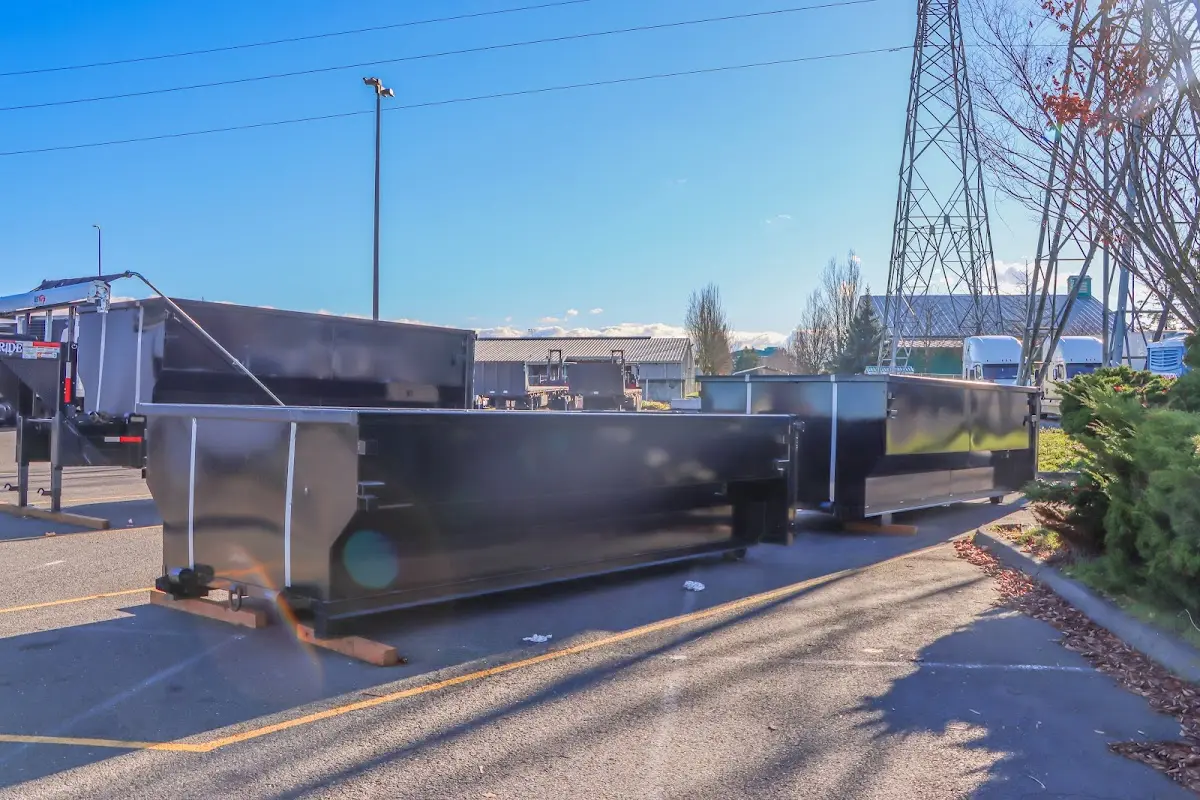 Roll-off dumpster ready for waste disposal at job site for 2 Yard Dumpster Rental in South Sioux City